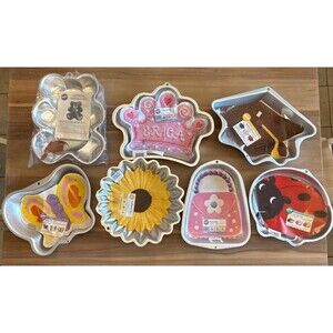 Vintage Lot Of 7 Wilton Cake Pans Bear Crown Graduation Ladybug Sunflower Purse